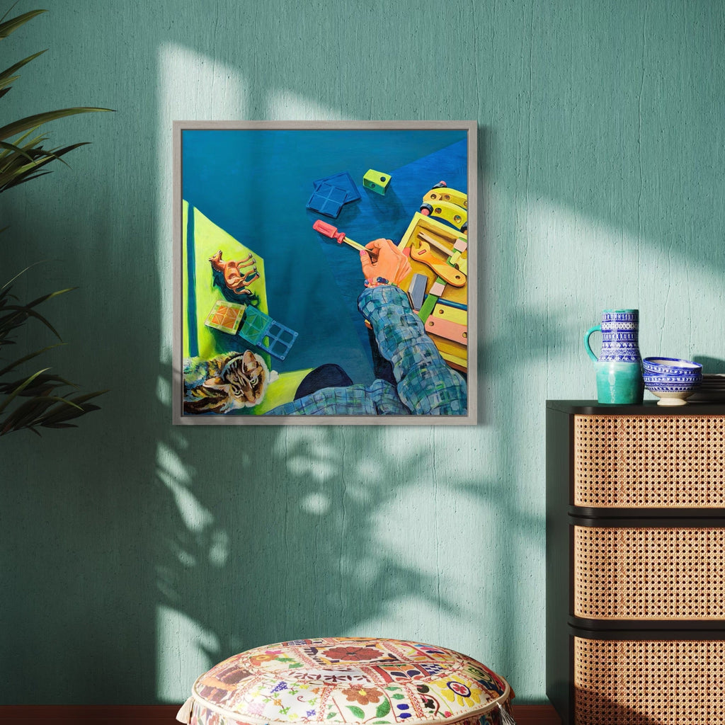 The artwork, Picking Up the Pieces, by Mary Younkin, displayed in a room.