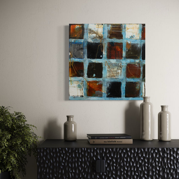 The artwork, Playdate in the City II, by Deborah Chaney, displayed in a room.