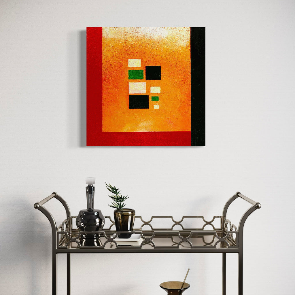 The artwork 'Pueblo #2' by Vanessa Ryan features a vibrant orange square canvas with geometric black, green, and white squares arranged in an abstract pattern. Bold red border on the left and black border on the right frame the composition. Textural sand elements create depth on the 24x24 inch acrylic painting.