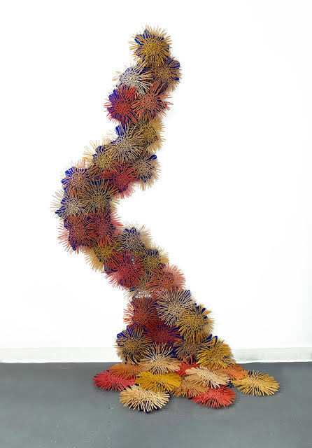 The artwork, RUSH, by Nora Chavooshian, displayed in a room.