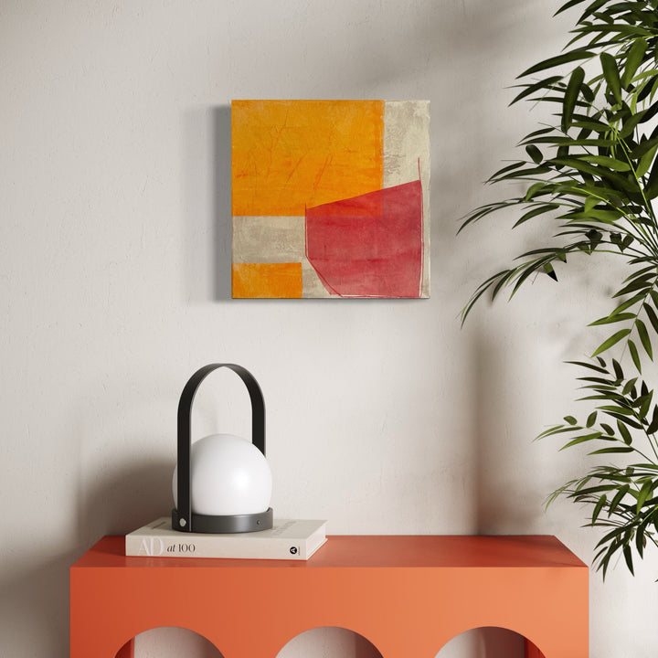 The artwork, Red, Orange and Buff III, by Diane Englander, displayed in a room.