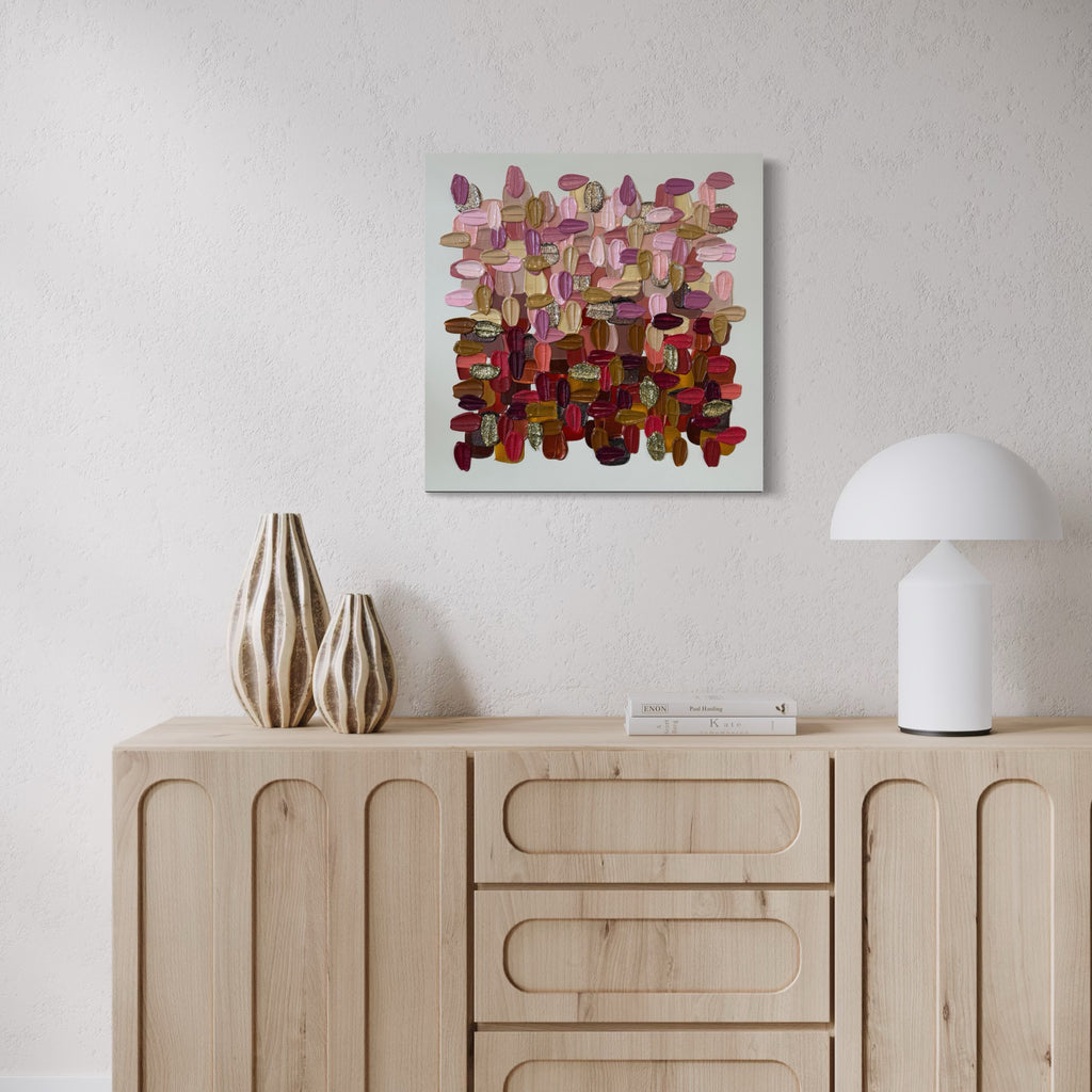 The artwork, Ruby Haze, by Shiri Phillips, displayed in a room.