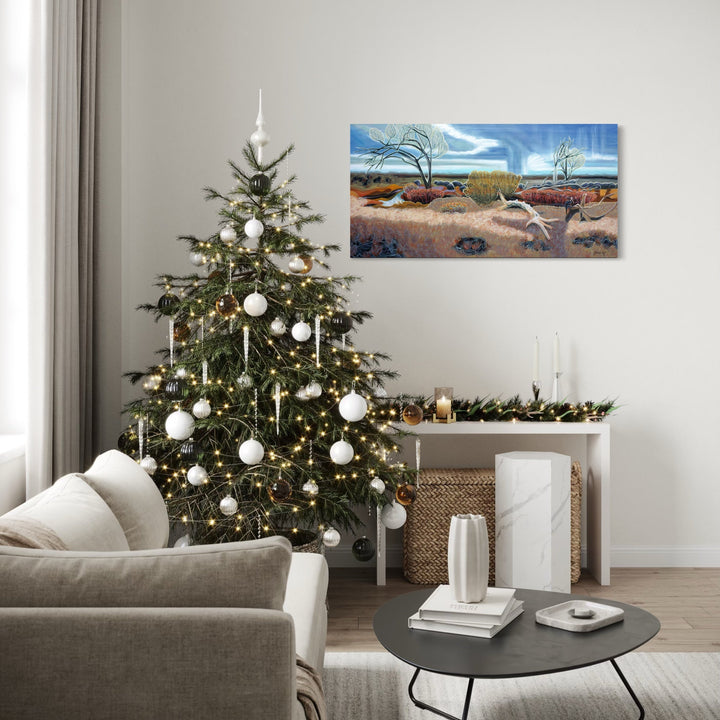 The artwork, Running Deer Park in Winter, by Gina Blickenstaff, displayed in a room.
