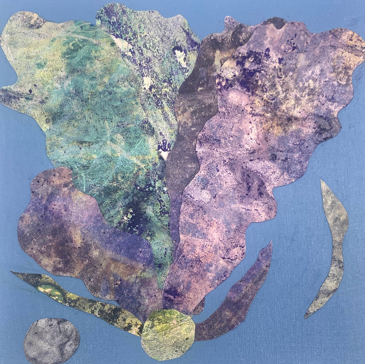 The artwork 'Sea Fan 1' by Sunny Chapman features an abstract marine-inspired composition on a blue background. A large coral-like form dominates the center, rendered in ethereal purples and seafoam greens with textured, mottled surfaces. Surrounding curved elements suggest floating seaweed or shell fragments, created using collaged alchemical prints and acrylic on wood panel.