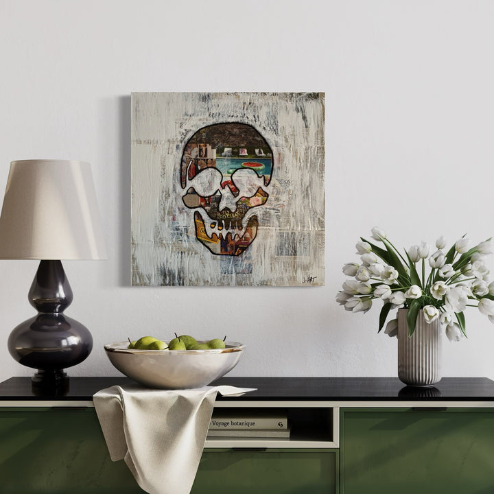 The artwork 'Showbiz' by Jean-Remi Barbier features a striking skull motif rendered in mixed media and acrylic on a 24x24 inch canvas. The skull wears reflective sunglasses with a cityscape reflection, set against a textured white background with distressed effects. Bold brushstrokes and urban art influences create a contemporary street art aesthetic.