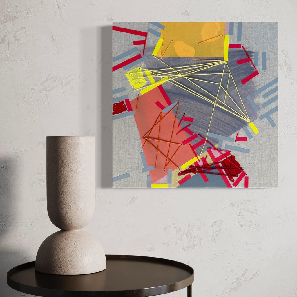 The artwork 'Shuunedvv' by Philippe Halaburda features dynamic intersecting lines and geometric shapes in vibrant red, yellow, and gray tones. Abstract composition combines bold tape strokes, delicate yarn elements, and acrylic paint on canvas, creating a contemporary urban aesthetic with energetic movement and spatial depth. 20x20 inches abstract artwork by Philippe Halaburda.