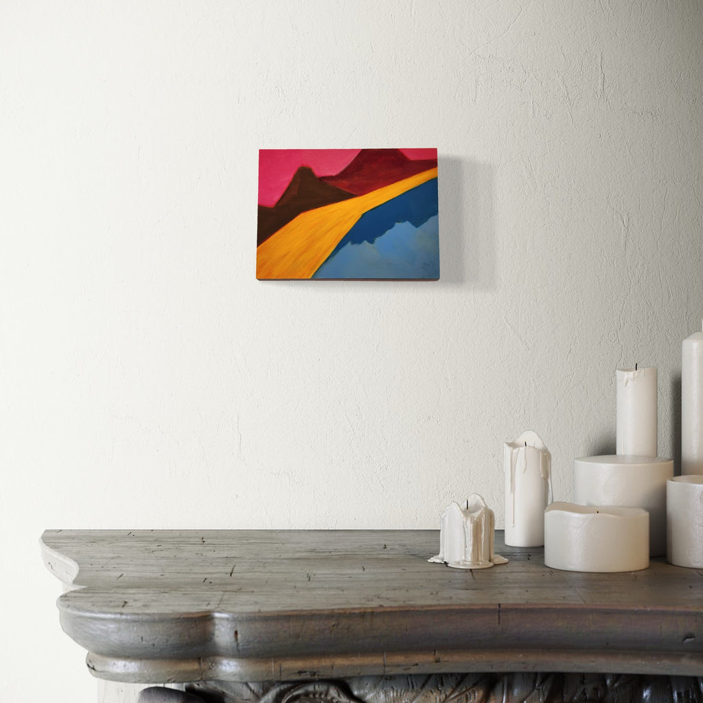 The artwork, Slide, by Joanie Flickinger, displayed in a room.