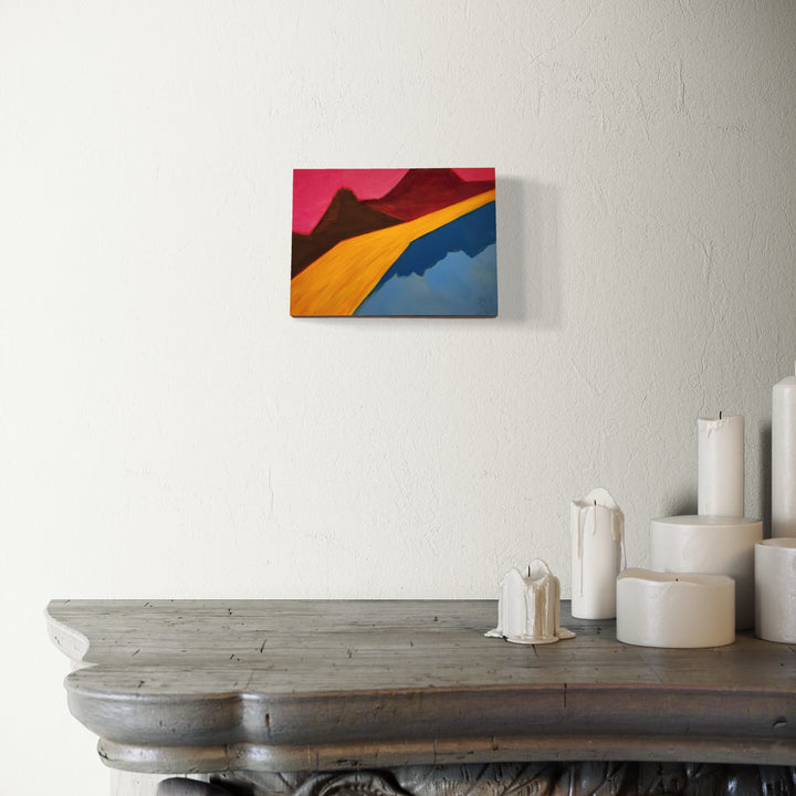 The artwork, Slide, by Joanie Flickinger, displayed in a room.