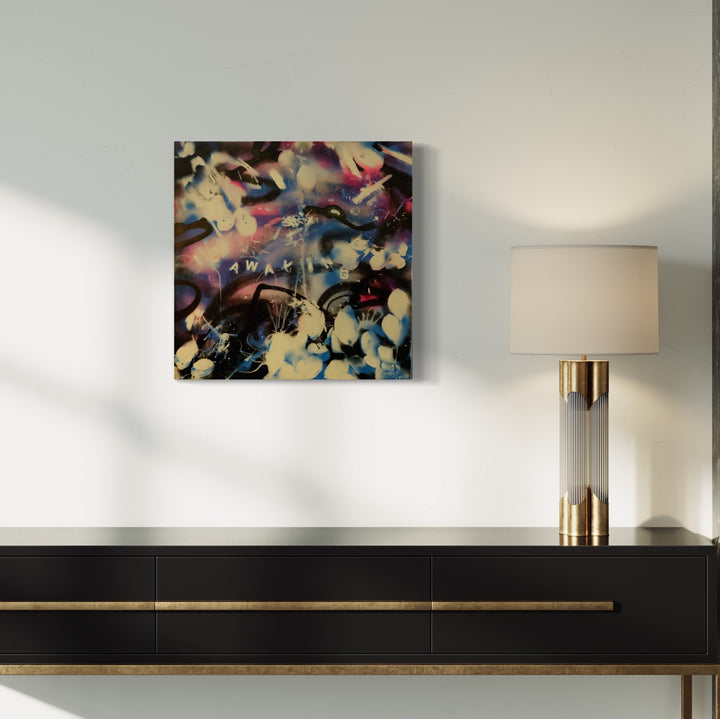 The artwork 'Snow Cone One' by Devin Ruiz features an abstract mixed media composition on canvas with dynamic swirls of deep blues, vibrant pinks, and cream colors. Ethereal bubble-like forms float across the surface, creating a dreamlike atmosphere. The 20x20 inch piece showcases a blend of fluid techniques and textural elements that evoke a cosmic or underwater scene. By Devin Ruiz.