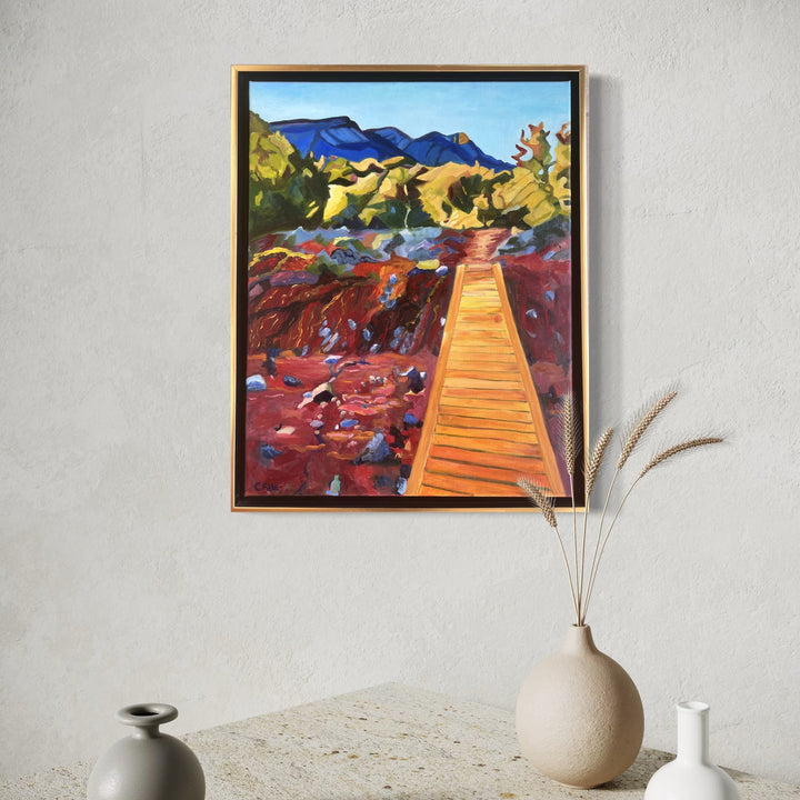 The artwork, Strip MIne Trail 6, by Connie Falk, displayed in a room.