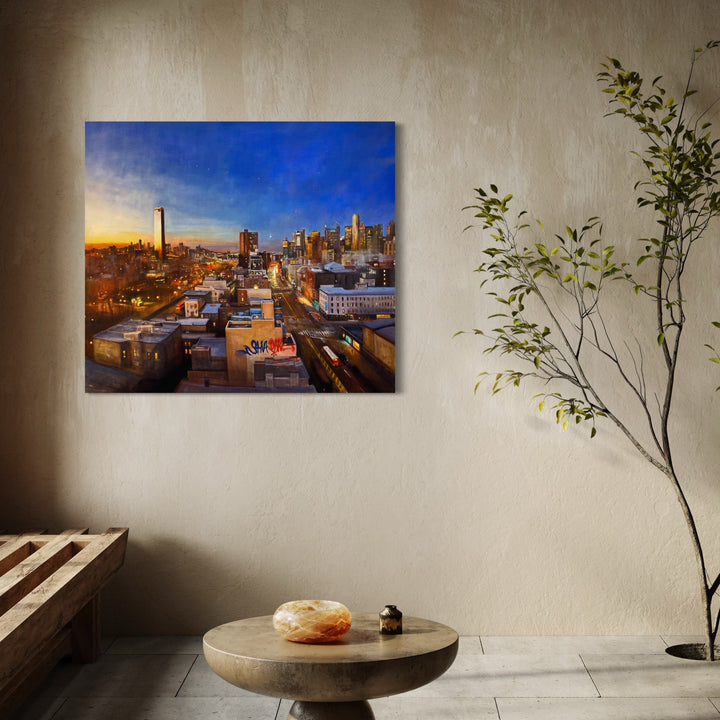 The artwork, Sunrise, Moon Setting Over Bowery, by Regina Miele, displayed in a room.