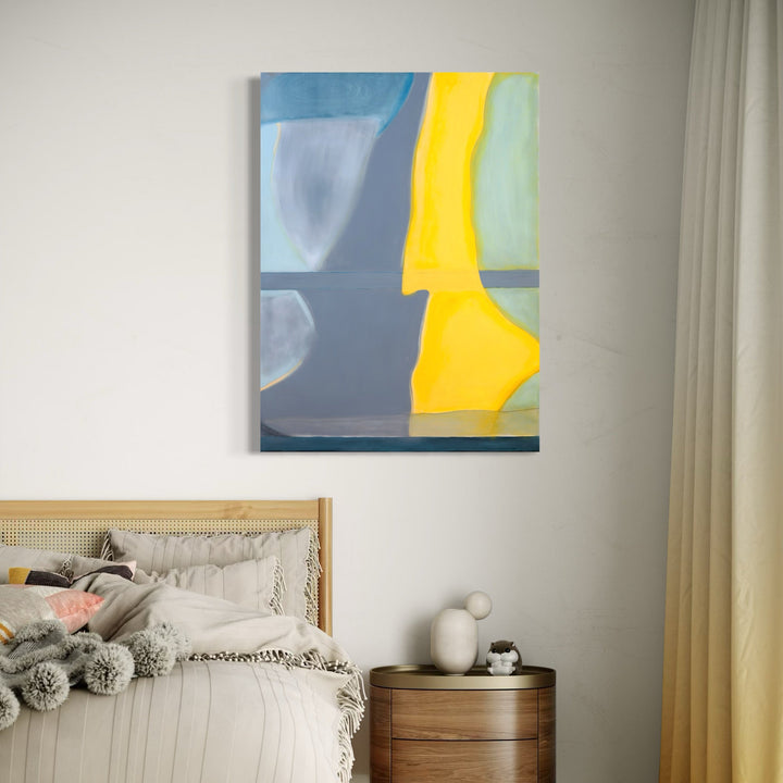 The artwork 'Sunrise in the West 17' by Cora Jane Glasser features bold geometric abstract shapes in vibrant yellow against soft blue and mint green backgrounds. The composition combines sharp angular forms with fluid curves, creating a dynamic interplay of light and shadow. Oil on Arches paper mounted on plexi showcases smooth color transitions and precise edge work.