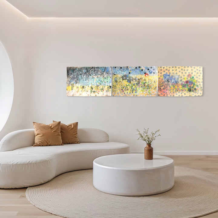 The artwork, Temperaca (tryptch), by Maureen Shea, displayed in a room.