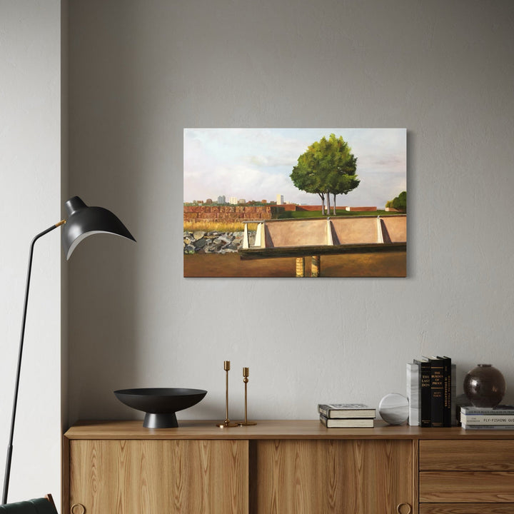 The artwork, Three Trees and a Pier, Riverside Park South NYC, by Jessica Ziegler, displayed in a room.
