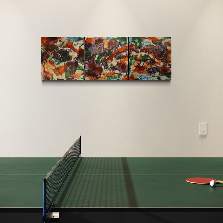 The artwork, Trees Walking Down to the Water, by Marlene Struss, displayed in a room.