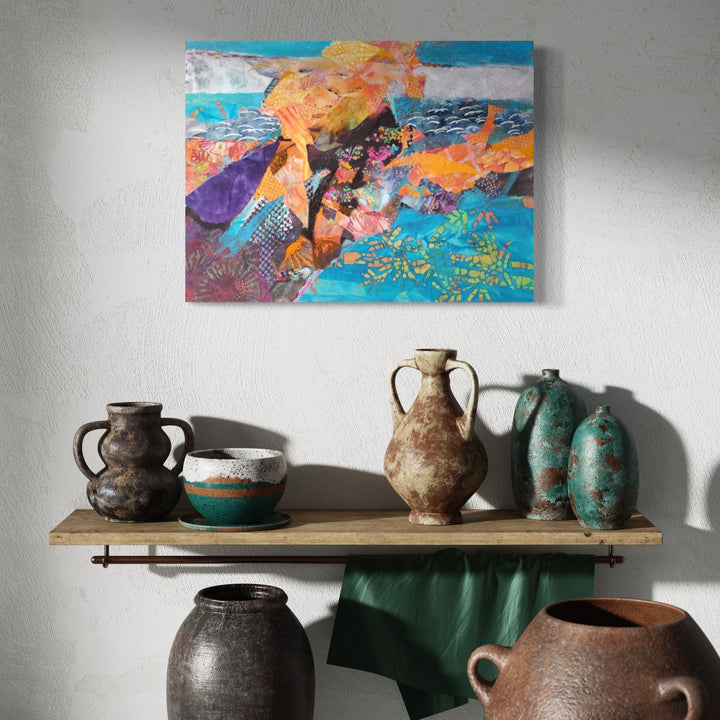 The artwork 'Trouble on the Ice Shelf' by James Ehling features a vibrant mixed-media composition of abstract forms in orange, purple, and turquoise. The dynamic piece combines acrylic paint and fabric on canvas, creating textural contrasts against a bright blue background suggesting an arctic landscape. The flowing shapes evoke a sense of movement and environmental transformation. 18x24 inches. By James Ehling.