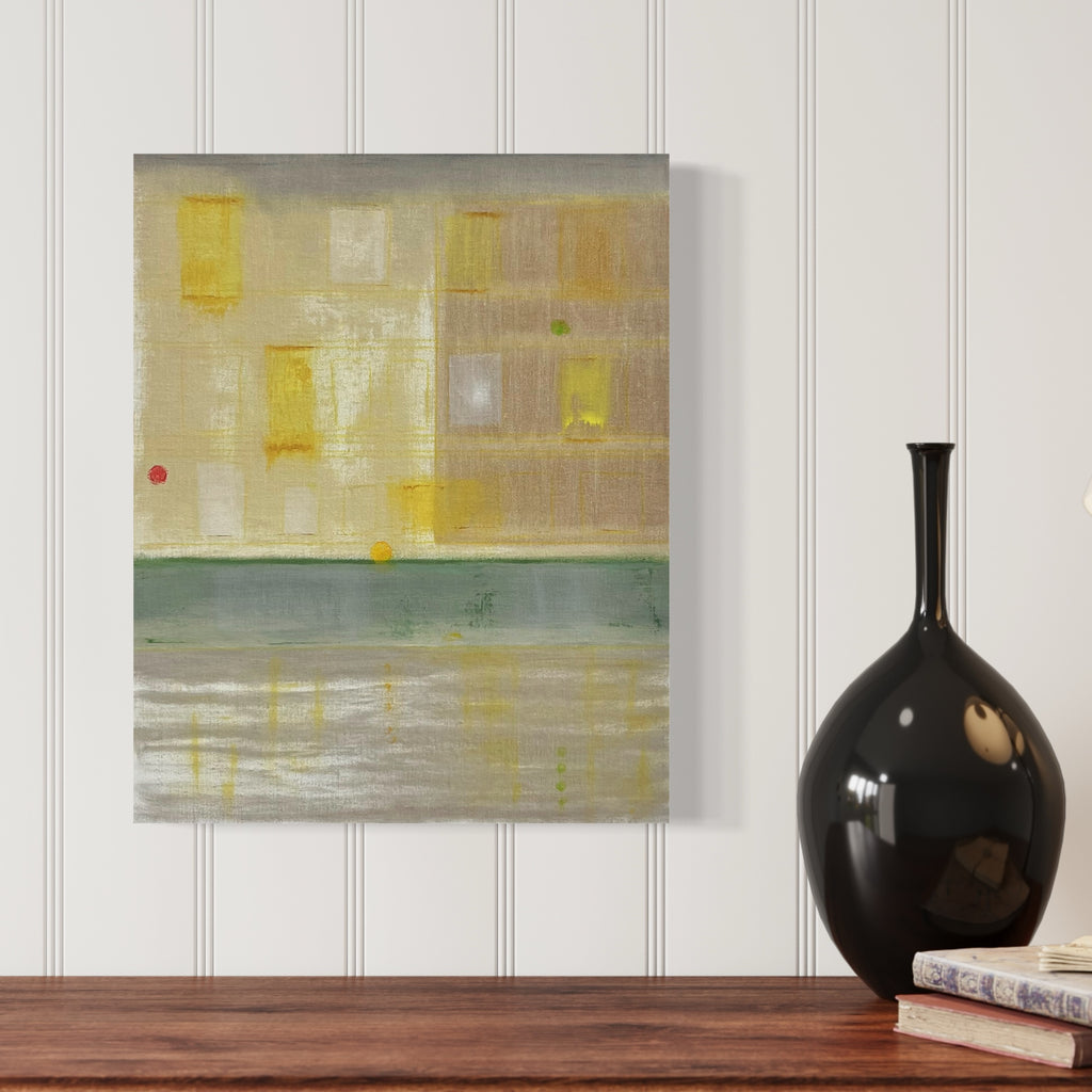The artwork 'Urban Light (Park Ave. In The Rain)' features an abstract cityscape rendered in soft yellow and gray tones, with a muted green-gray horizontal divide suggesting a rain-slicked street. The composition captures the ethereal glow of city lights reflecting on wet pavement through minimalist geometric forms and subtle color transitions. Oil on linen on wood panel by Cora Jane Glasser.