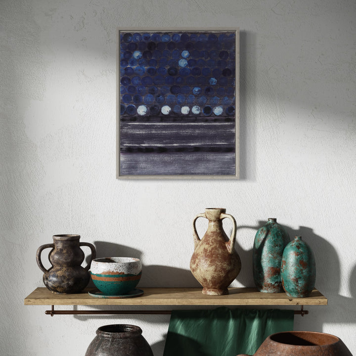 The artwork 'Vault Lights (Time Lapse-6)' features abstract circular patterns in deep midnight blues and white, arranged in a grid-like formation against a dark background. Below, horizontal bands in charcoal gray create a grounding effect. Oil on stretched linen captures subtle texture variations. Art by Cora Jane Glasser.
