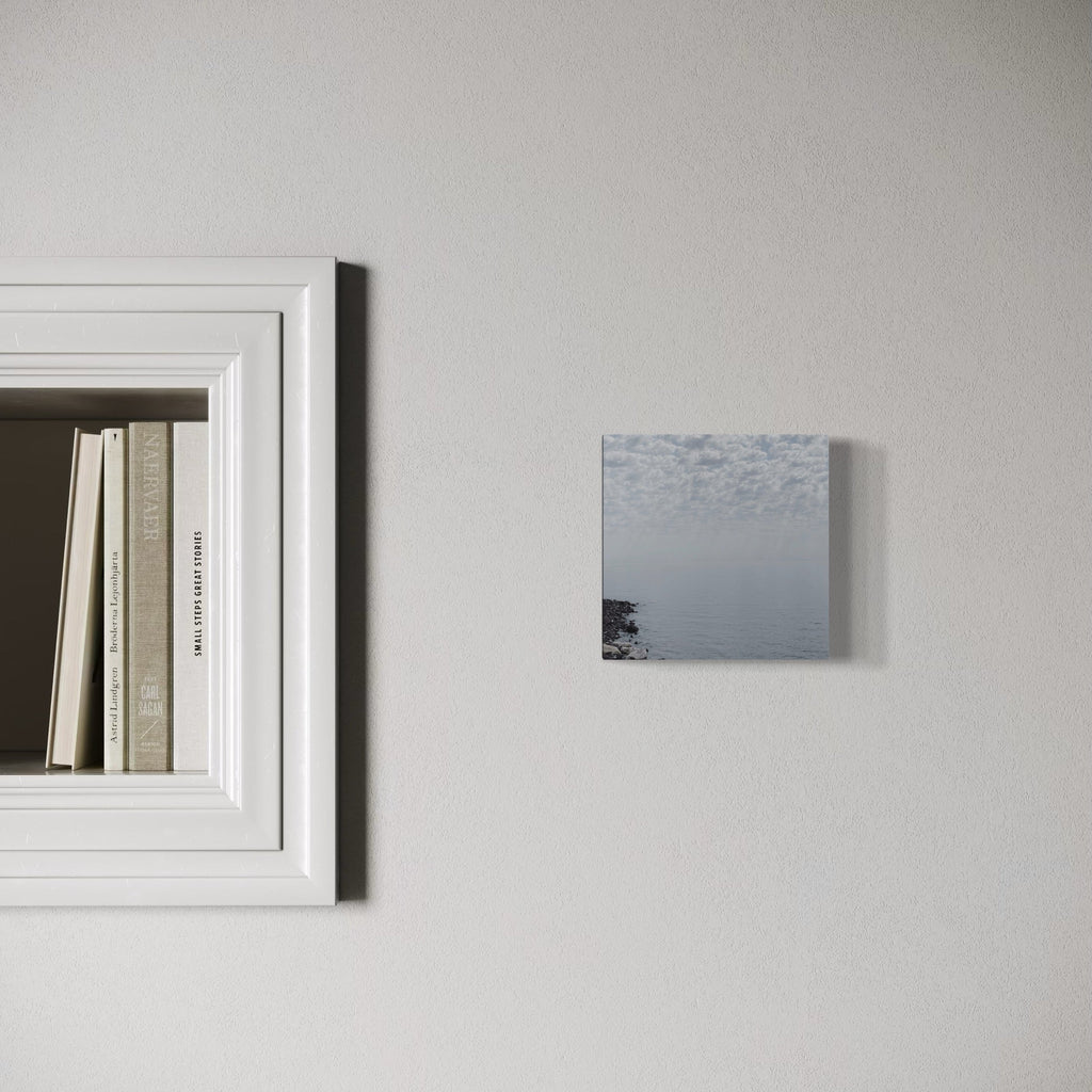 The artwork, White, Lake Superior, by Ann Tracy, displayed in a room.