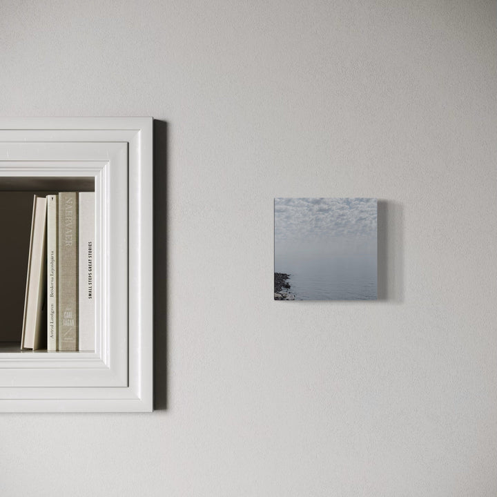 The artwork, White, Lake Superior, by Ann Tracy, displayed in a room.