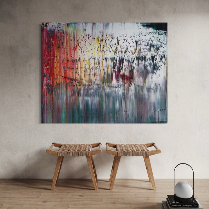 The artwork, abstract talking heads in the snow, by Harry Moody, displayed in a room.