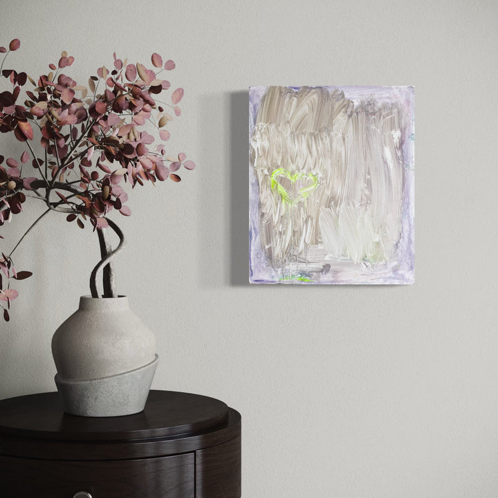The artwork, once more softly , by Aliza Sternstein, displayed in a room.