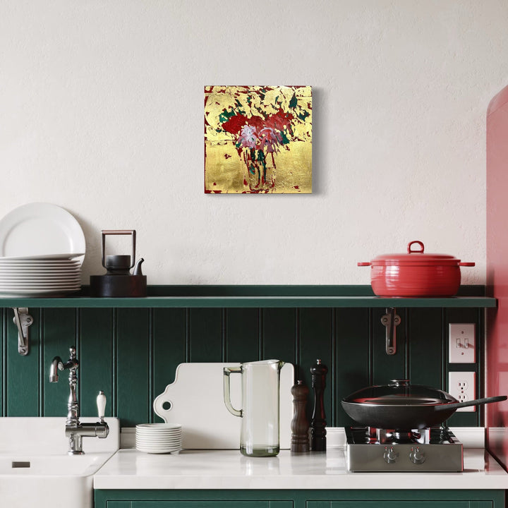 The artwork, Roses in a glass vase, by Owen Brown, displayed in a room.