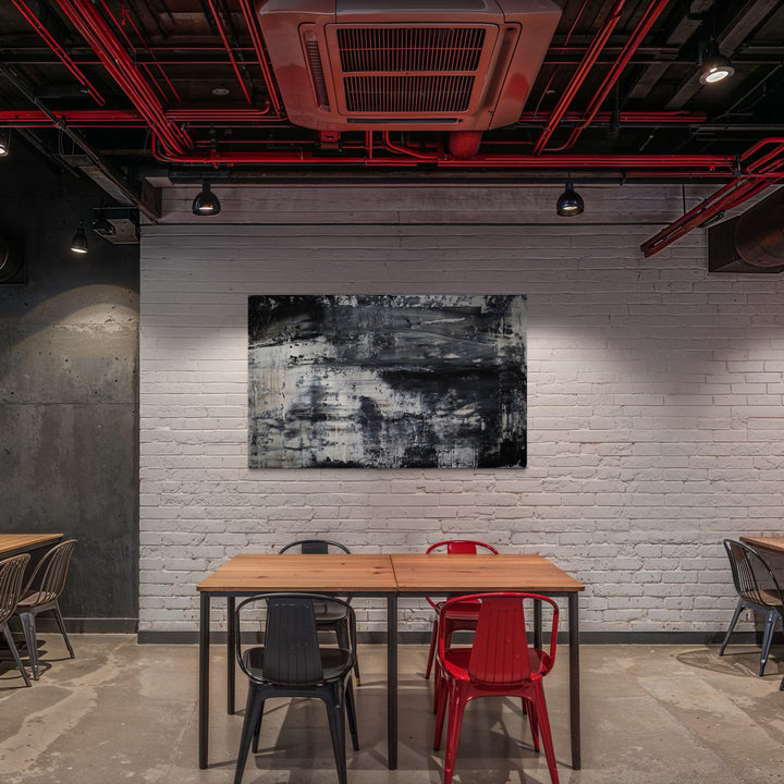 The artwork, trauerbild, by Harry Moody, displayed in a room.