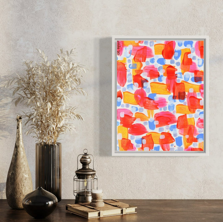 The artwork 'moodi avec (other people's oat milk)' by Taylor Binda features an abstract composition of vibrant red, orange, and light blue shapes flowing across watercolor paper. The playful pattern creates a mosaic-like effect with translucent acrylic brushstrokes interweaving in a dynamic, organic arrangement. The piece displays a harmonious balance between warm and cool tones. By Taylor Binda.
