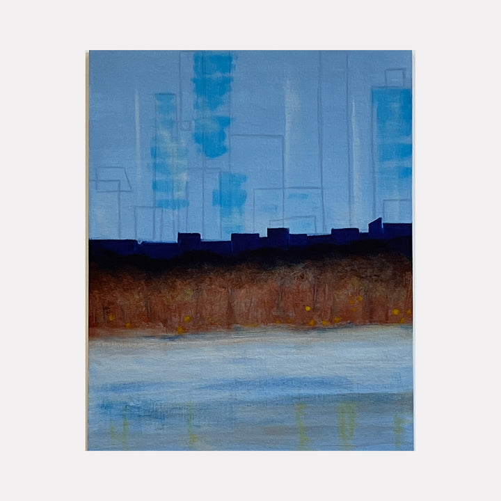 The artwork 'The Blue Hour (distant)' by Cora Jane Glasser features an abstract cityscape silhouetted against a luminous blue sky. A rich brown terrain separates the urban horizon from a tranquil blue water surface, creating a serene geometric composition executed in oil on linen. The painting captures the atmospheric quality of dusk through layered brushwork and gradients.