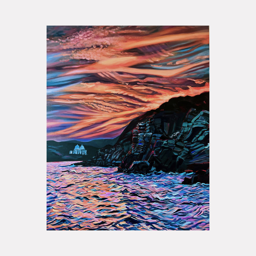 The artwork 'Ancestral Call' by Claudia Robles-Gil depicts a dramatic coastal landscape with swirling orange and pink sunset clouds reflecting on choppy waters. Dark rocky cliffs dominate the foreground, while distant buildings nestled along the shore create a serene silhouette against the vibrant sky. The impressionistic style captures the dynamic movement of waves and clouds through bold brushstrokes and contrasting colors.