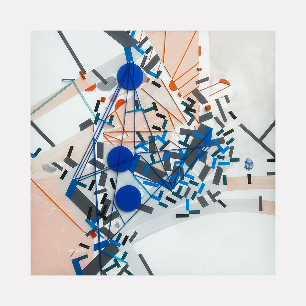 The artwork 'Shatteraau' by Philippe Halaburda features an abstract geometric composition with vibrant blue circular elements and orange linear rays bursting from a central point. Black angular fragments scatter across a pale background, creating dynamic movement and spatial depth in mixed media on a 36x36 inch canvas.