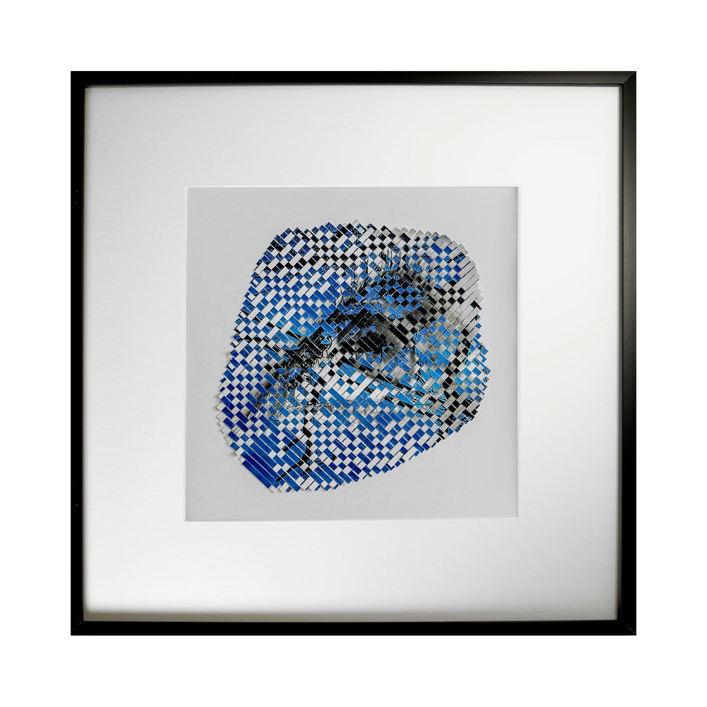 The artwork 'Silhouette' by Kiana Honarmand features an abstract woven pattern in vibrant blue and black checkered design. Hand-cut giclee prints are intricately woven to create a circular formation against a white background, measuring 16x16 inches. The geometric pattern creates a dynamic visual effect with contrasting colors and textures, framed in sleek black. By Kiana Honarmand.