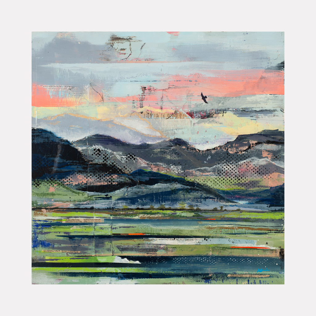 The artwork 'Traveling West' by Nicki Adani features a vibrant abstract landscape with layered mountains in deep blues and grays, set against a dreamy sunset sky in coral and pale yellow. Textured mixed media elements create dynamic patterns across rolling hills, while fresh green meadows and reflective waters span the foreground. 24x24 inches on wood panel by Nicki Adani.