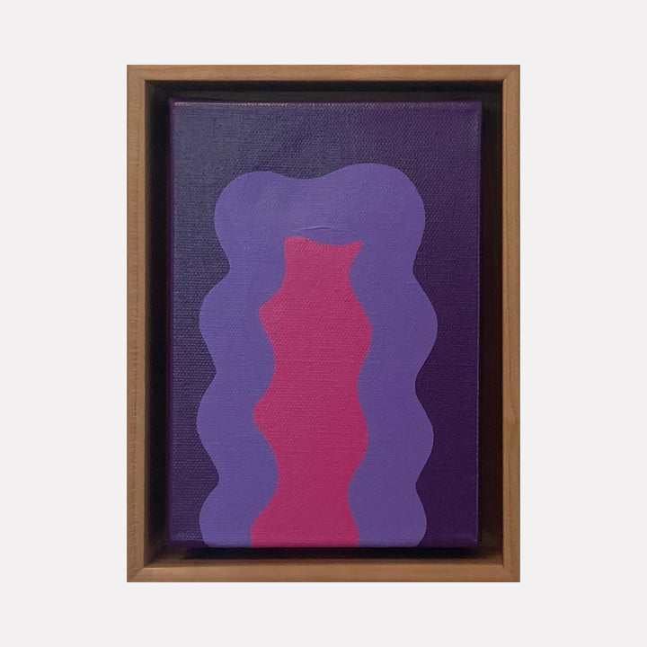 The artwork 'Violet Mini' by Shadia Sabagh features an abstract composition with a vibrant pink wavy column centered against a deep purple organic shape on a darker purple background. The acrylic painting showcases fluid, biomorphic forms creating a harmonious contrast between warm and cool tones, framed in wood.
