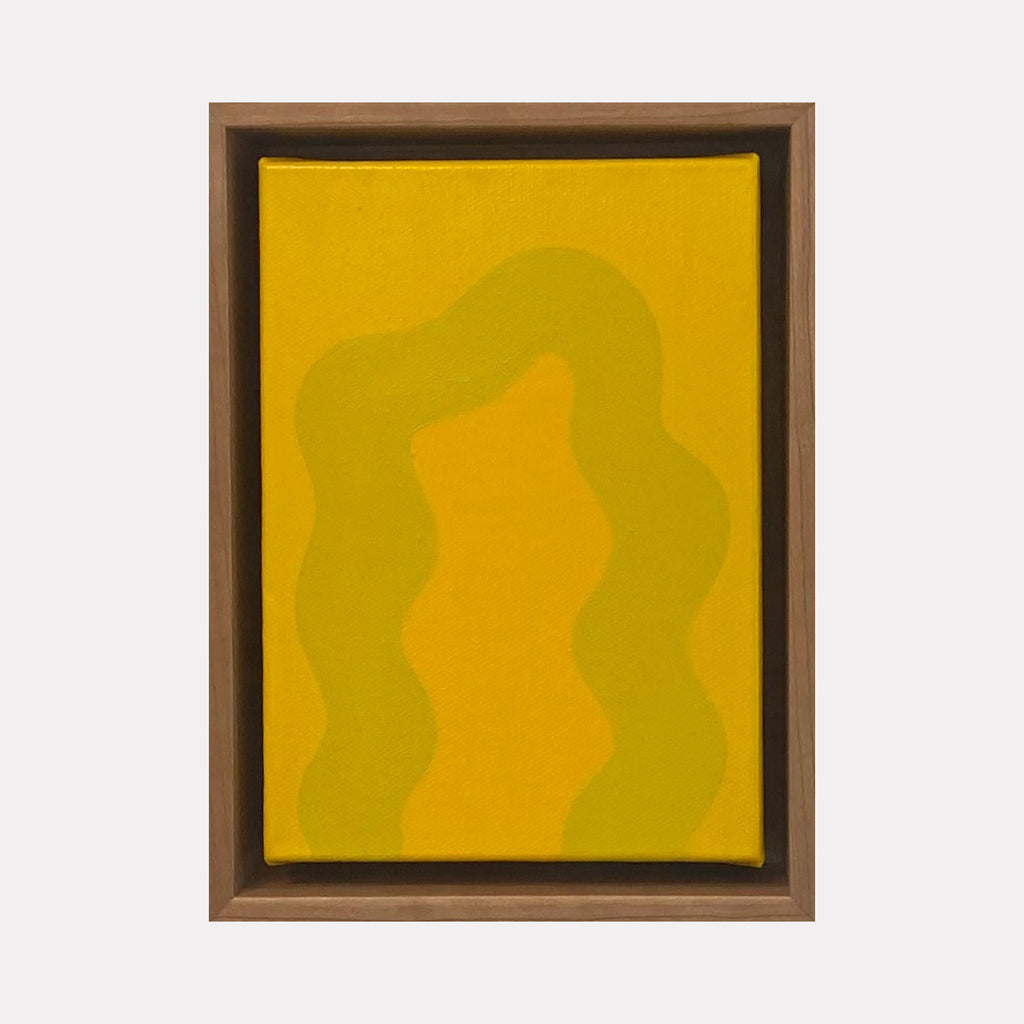 The artwork 'Yellow Mini' by Shadia Sabagh features an abstract composition with flowing wavy lines in vibrant yellow and golden hues, painted in acrylic on canvas. The organic curves create a gentle rippling effect against the bright yellow background, framed in a classic brown wooden frame. 8x6 inches contemporary minimalist artwork.