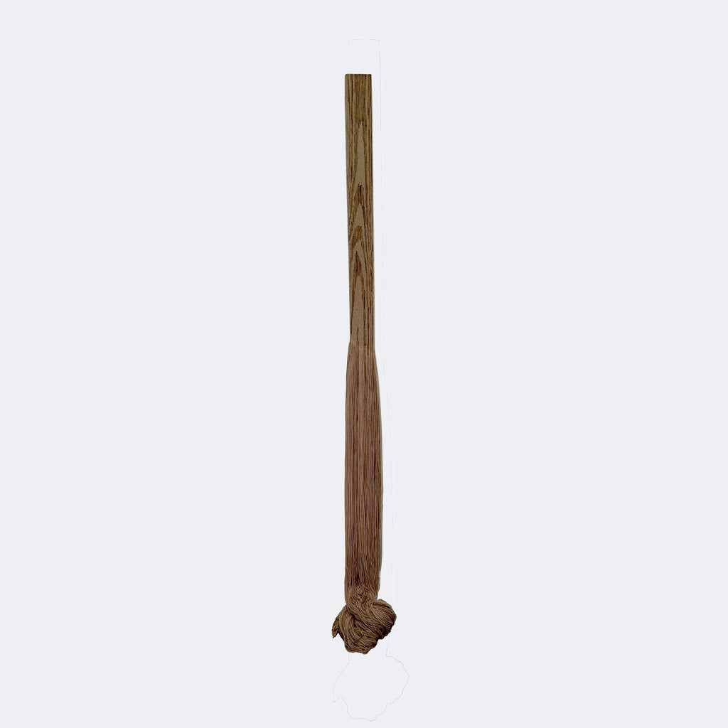 The artwork "Fluid Beam (Taupe)" by Quynn Douglas Dale features a long, slender vertical form resembling a wooden beam with a natural grain texture. The taupe color palette blends subtle brown and gray tones, creating a minimalist, organic aesthetic reminiscent of the naturalism in Georgia O'Keeffe’s works and the simplicity found in Donald Judd’s minimalist sculptures.