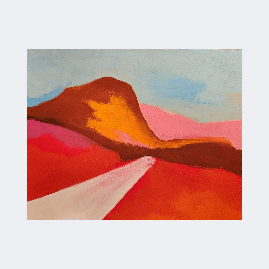 The artwork "3" by Joanie Flickinger features a vibrant abstract landscape dominated by bold reds, oranges, and pinks, with a central mountain-like shape glowing in warm yellow and orange hues. The sky is soft blue with wispy clouds, evoking the style of Georgia O'Keeffe's Southwestern scenes and abstract expressionism.