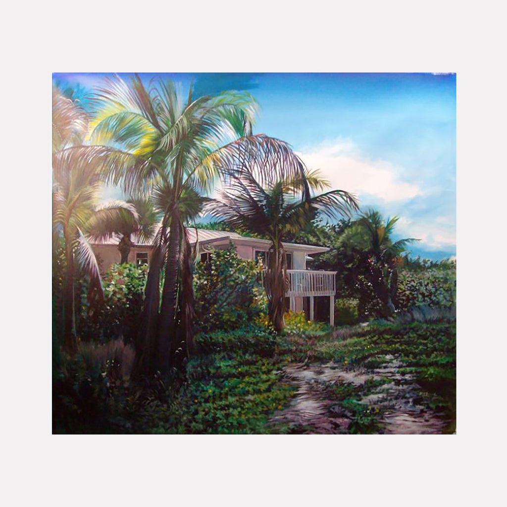 The artwork "Beach House — Robert Rauschenberg Estate, Captiva, Florida" by David Bunn Martine features a luminous, realistic depiction of a tropical landscape with lush green palm trees and dense foliage framing a modest beach house under a vibrant blue sky with soft clouds. The detailed textures and light interplay evoke the serene naturalism found in works by Edward Hopper and Winslow Homer.