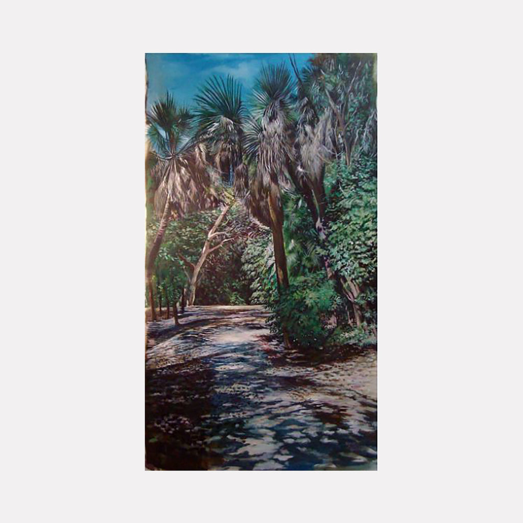 The artwork "Jungle Road (Robert Rauschenberg Estate, Captiva, Florida)" by David Bunn Martine portrays a sunlit forest path flanked by tall palms and dense green foliage. The detailed textures and realistic light interplay evoke a serene natural scene, reminiscent of the atmospheric realism found in works by Andrew Wyeth and the lush landscapes of Albert Bierstadt.