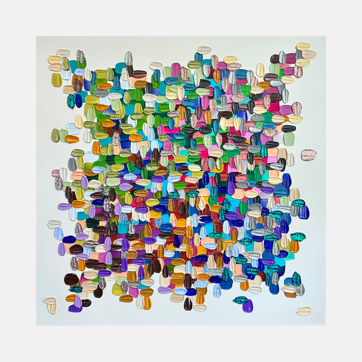 A Bottle of Glitter by Shiri Phillips displays a lively arrangement of multidimensional, oval-shaped brushstrokes in a vivid palette of greens, blues, purples, oranges, and earth tones. The composition features a scattered yet cohesive pattern that radiates texture and subtle movement in a contemporary abstract style.