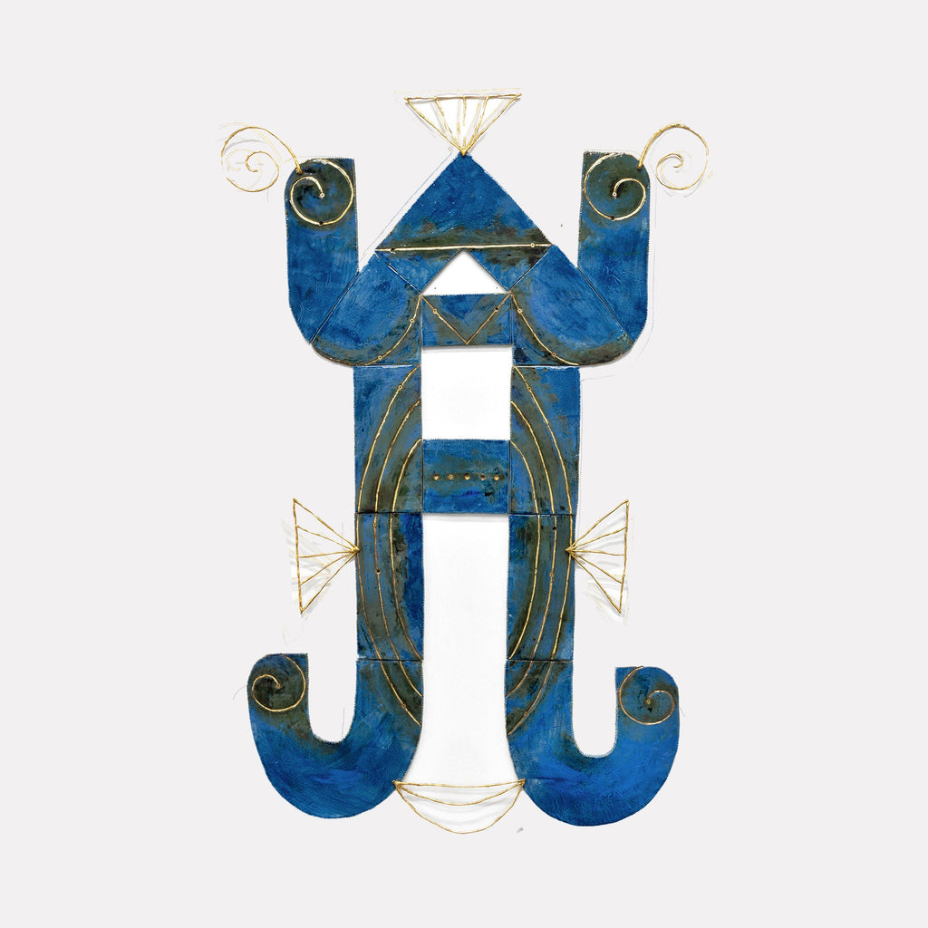 The artwork "Bleu Blanc Belge" by Adina Andrus features a symmetrical abstract composition with curved and angular blue forms accented by delicate gold wire details. The textured shapes evoke a sculptural, tribal aesthetic reminiscent of Alexander Calder’s mobiles and the geometric abstraction seen in Paul Klee’s works.