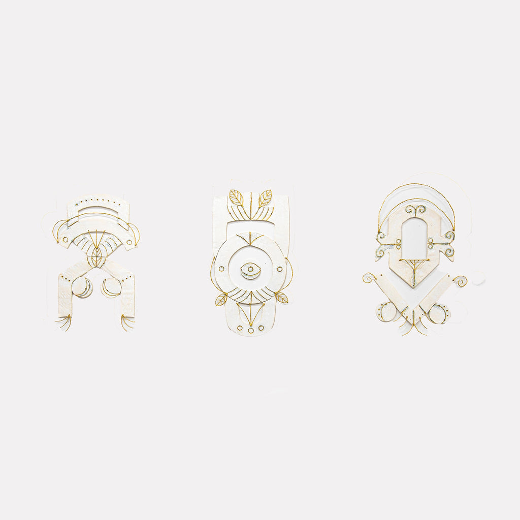 The artwork "Only One Third" by Adina Andrus features three delicate, abstract sculptural forms with intricate, fine line details in a soft, neutral palette. The elegant, geometric shapes with organic flourishes evoke minimalistic abstraction, reminiscent of Paul Klee’s playful compositions and the refined linearity seen in Cy Twombly’s drawings.