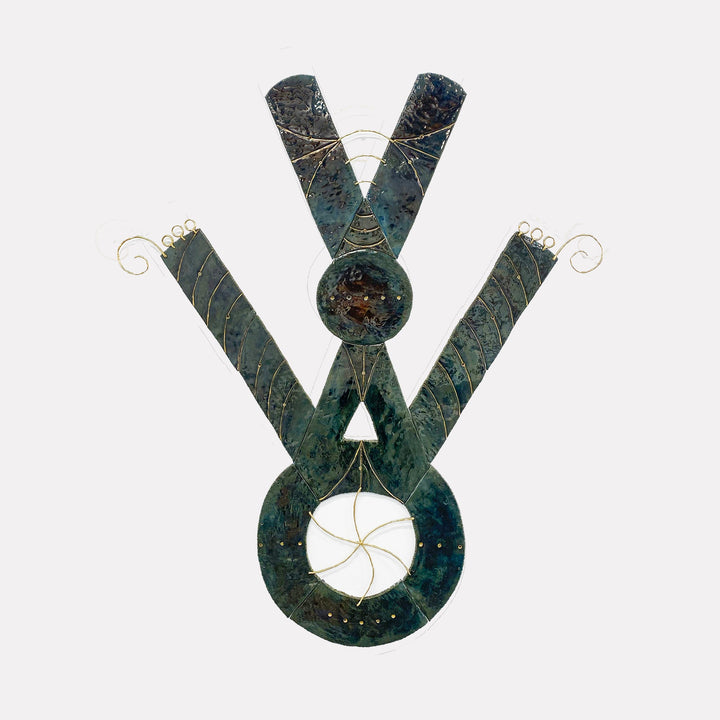 The artwork "Short Fall" by Adina Andrus features an abstract geometric composition with textured dark green and black shapes resembling an hourglass and circular forms, accented by delicate gold wire spirals. The style evokes modernist influences reminiscent of Alexander Calder's wire sculptures and the minimalism of Frank Stella.