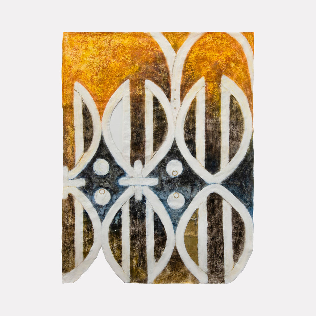 The artwork "Triclinium West" by Adina Andrus features a sculptural piece with an abstract geometric design composed of elongated, oval shapes and intersecting lines in warm golds, deep blues, and muted browns. The textured surface and bold contrasts evoke a modernist abstraction reminiscent of mid-century artists like Ellsworth Kelly and Frank Stella.