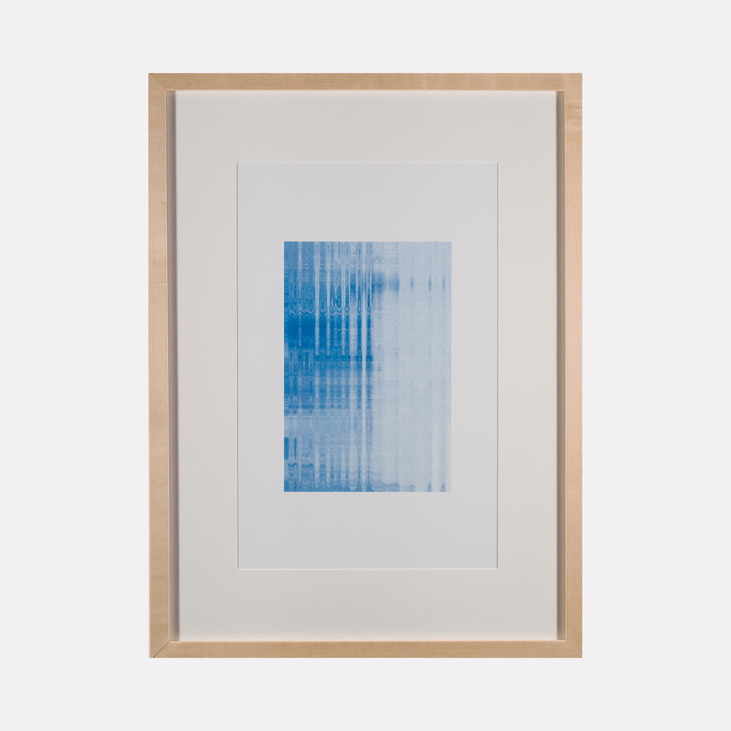 Algorithmic Textures (#6) by Craftwork displays a framed abstract print in shades of blue with vertical and horizontal linear patterns, blending soft gradients and subtle texture for a modern, minimalist expression of contemporary art.