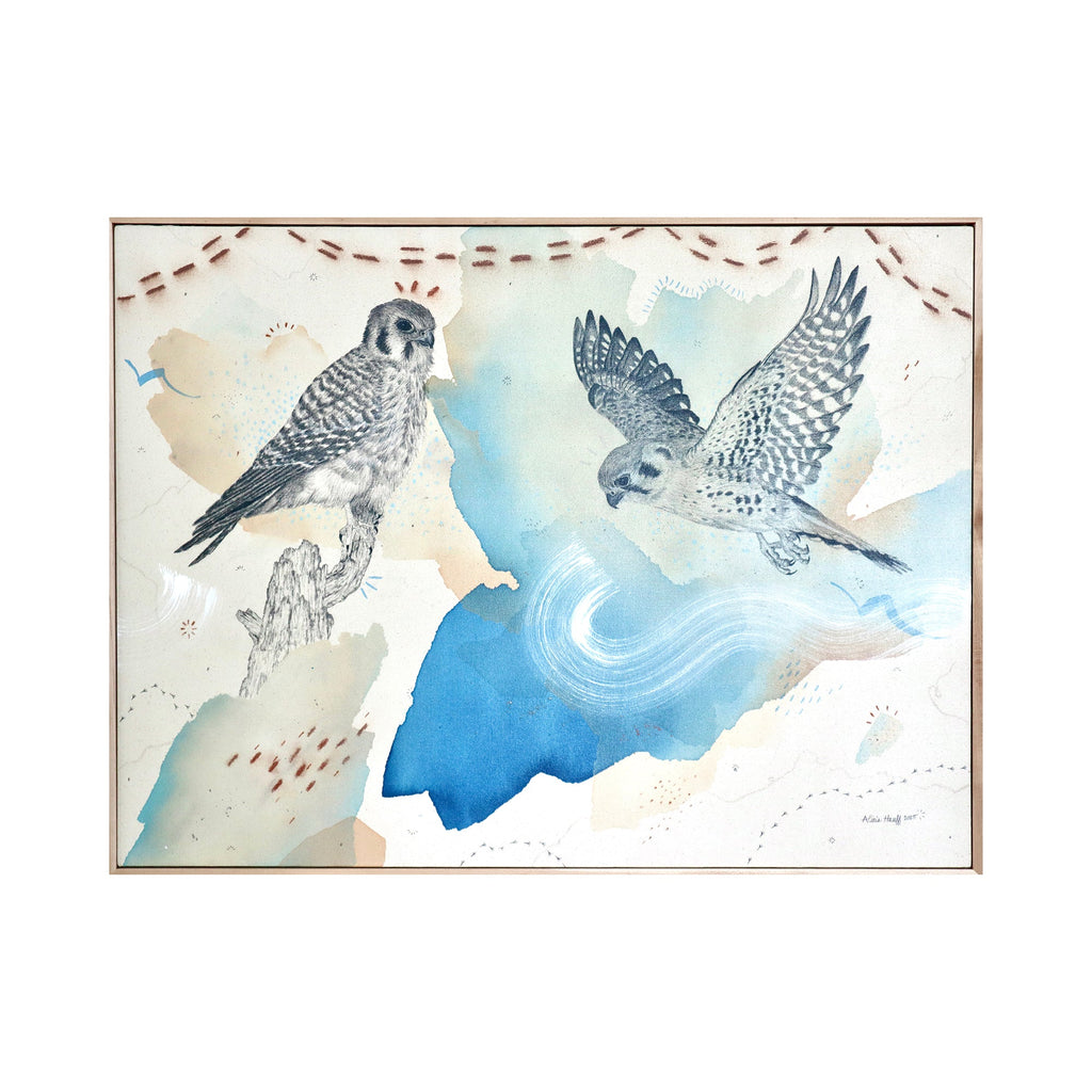 The artwork "American Kestrel, Small But Fierce" by Alicia Hauff features two detailed kestrels rendered in delicate pencil and ink with soft washes of blue, beige, and brown watercolor. The textured layering and flowing aerial forms evoke a serene natural landscape, reminiscent of John James Audubon’s ornithological illustrations and the atmospheric quality of Winslow Homer’s watercolors.