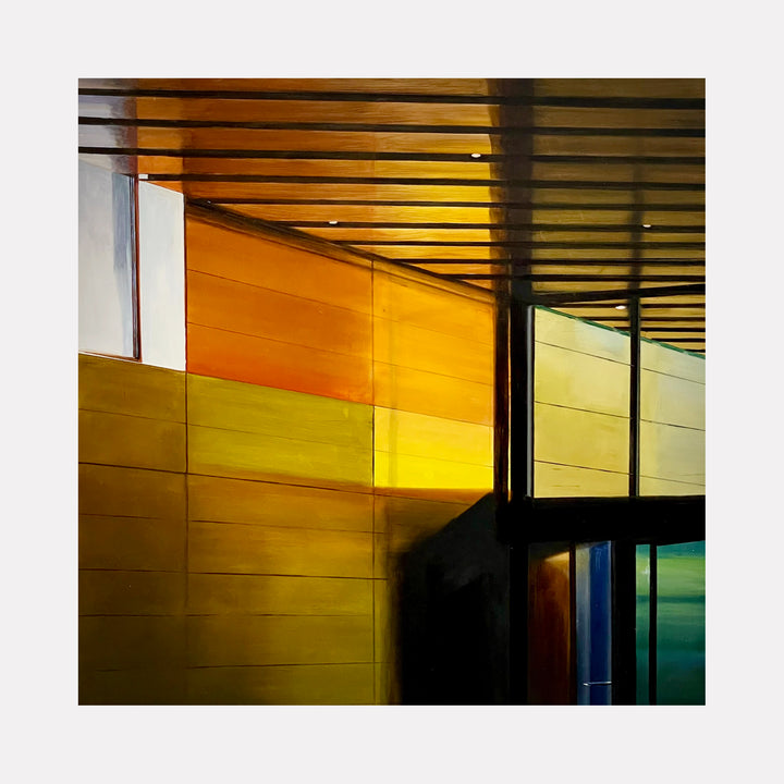 The Lobby at the Sofia by Allan Gorman captures a serene architectural scene with warm amber and ochre panels contrasted by deep shadows and reflective glass surfaces. The composition evokes a contemplative mood through its interplay of light, geometric forms, and the quiet atmosphere of an urban interior.
