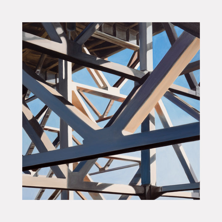 The Tallest Train Station in NYC by Allan Gorman presents an intricate network of intersecting steel beams set against a clear blue sky. The composition emphasizes structural geometry and depth through its sharp angles, contrasting shadows, and a grid-like pattern that conveys a dynamic urban architectural perspective.