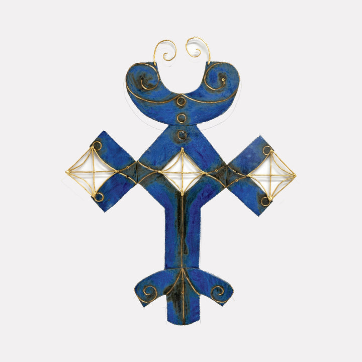 The artwork "Cannoli Wars" by Adina Andrus features a symmetrical, abstract form painted in deep blue with black accents, outlined and adorned with delicate gold wire detailing. The textured surface and geometric shapes evoke a modernist aesthetic, reminiscent of Paul Klee’s intricate abstractions and Joan Miró’s playful, biomorphic forms.